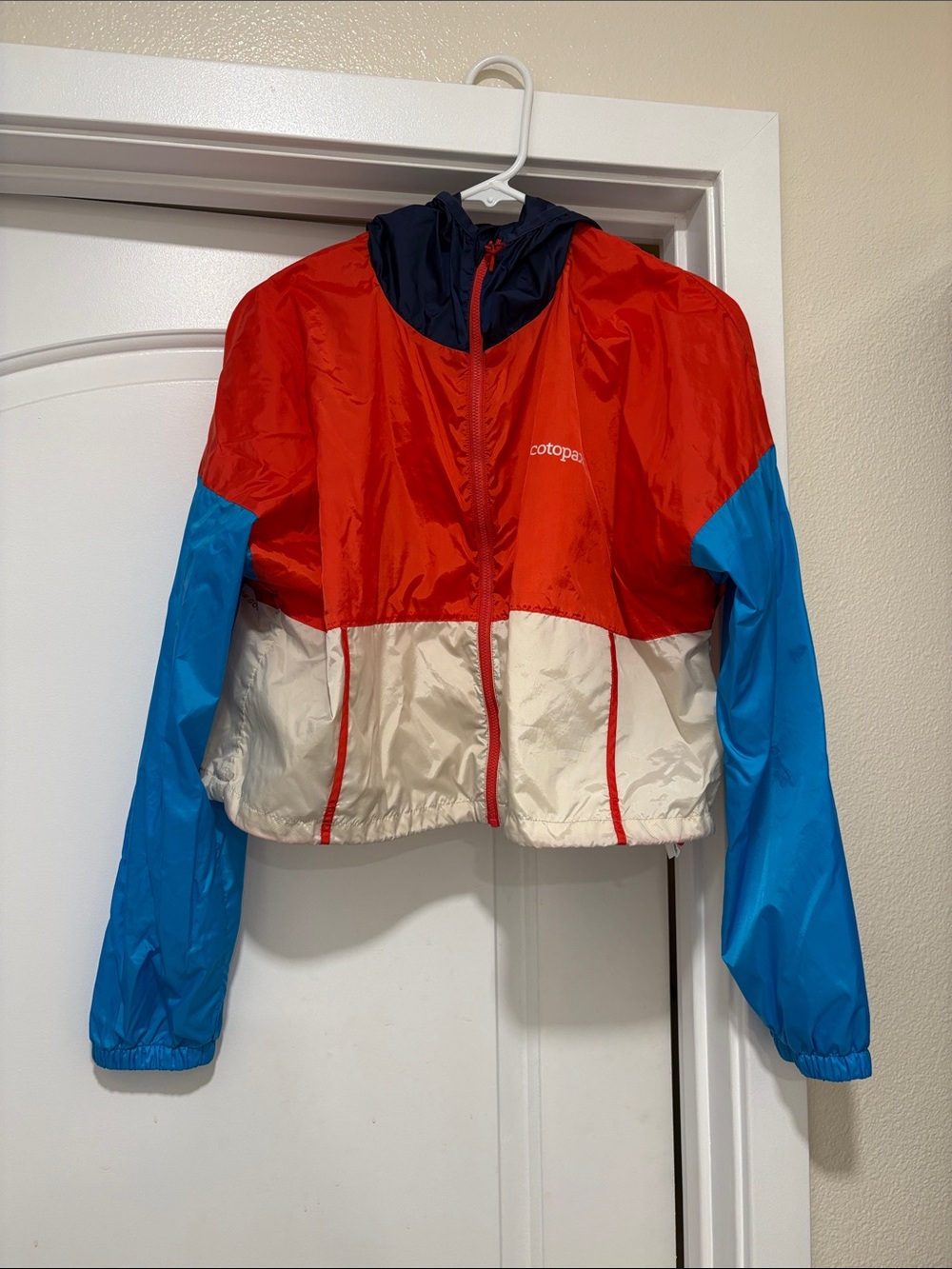 Cotopaxi women’s cropped rain jacket